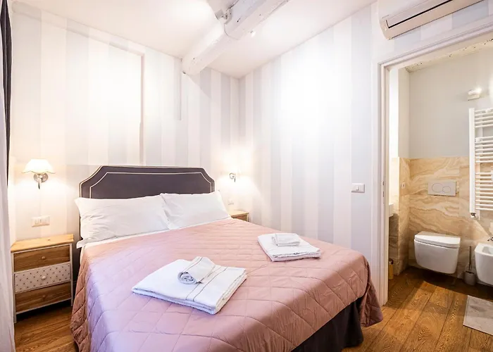 In Pz. Michelangelo: Due Con Due Bagni Appartement